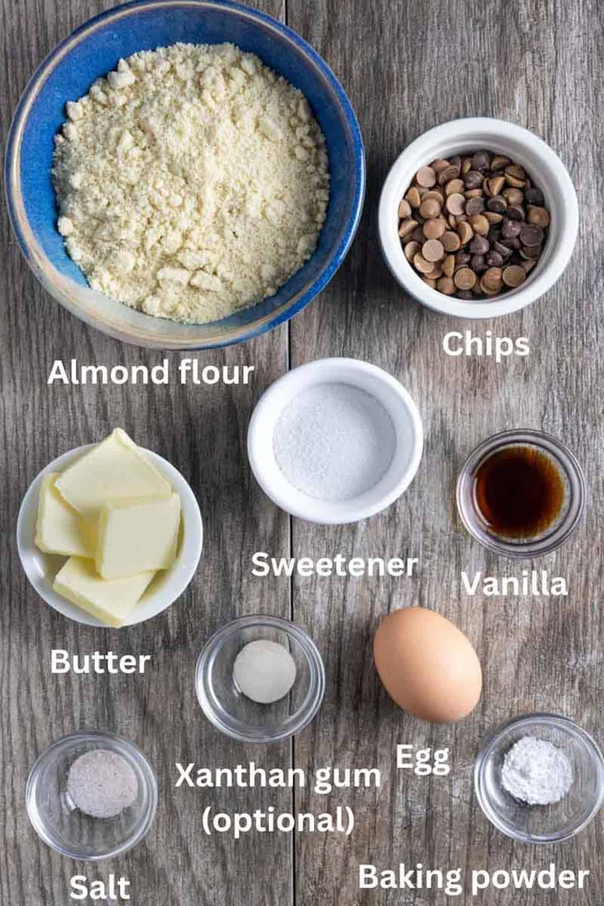 Ingredients for skillet cookie on a board with white text labels.