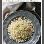 Riced cauliflower on a pewter plate garnished with parsley.