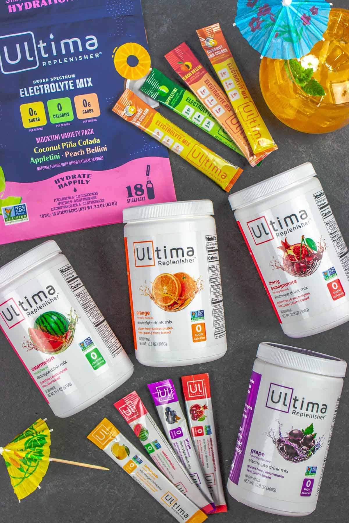 Assortment of Ultima brand electrolyte powders in packaging.