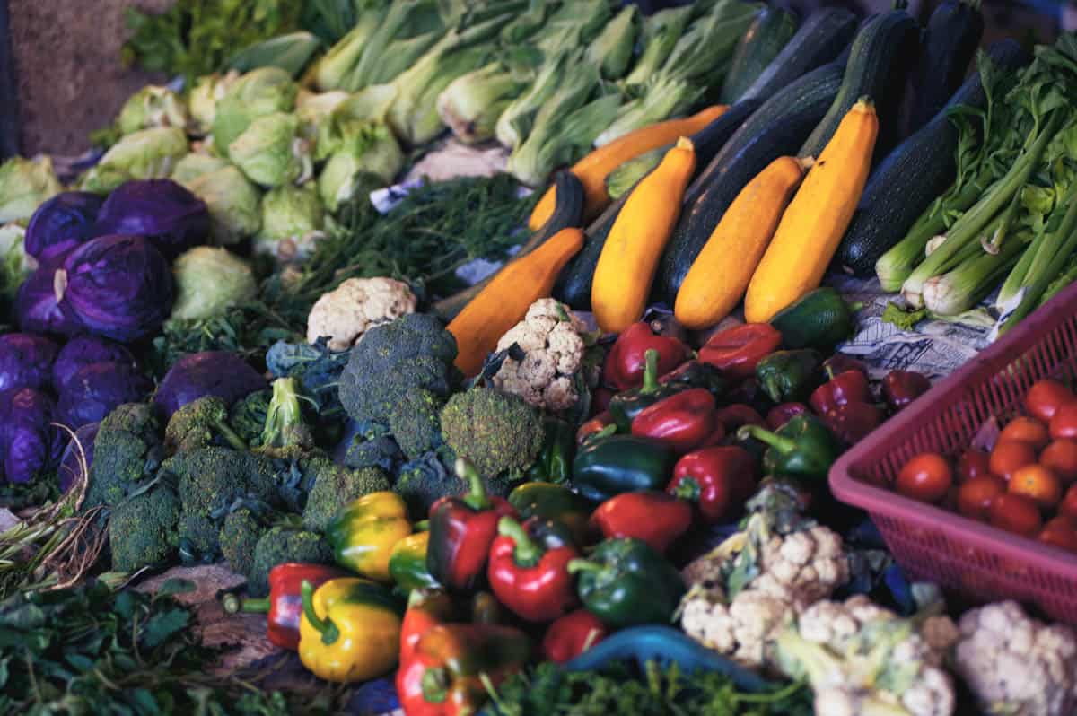 A market vegetable section with colorful vegetables.