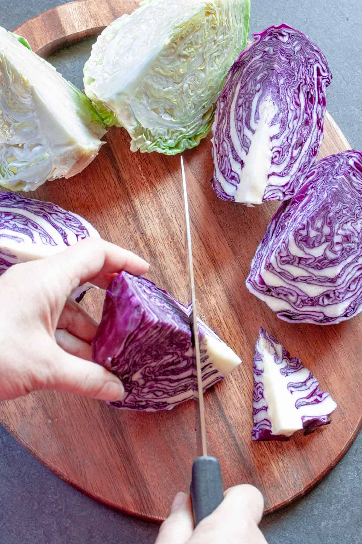 https://radfoodie.com/wp-content/uploads/2022/07/coring-cabbage-quarters.jpg