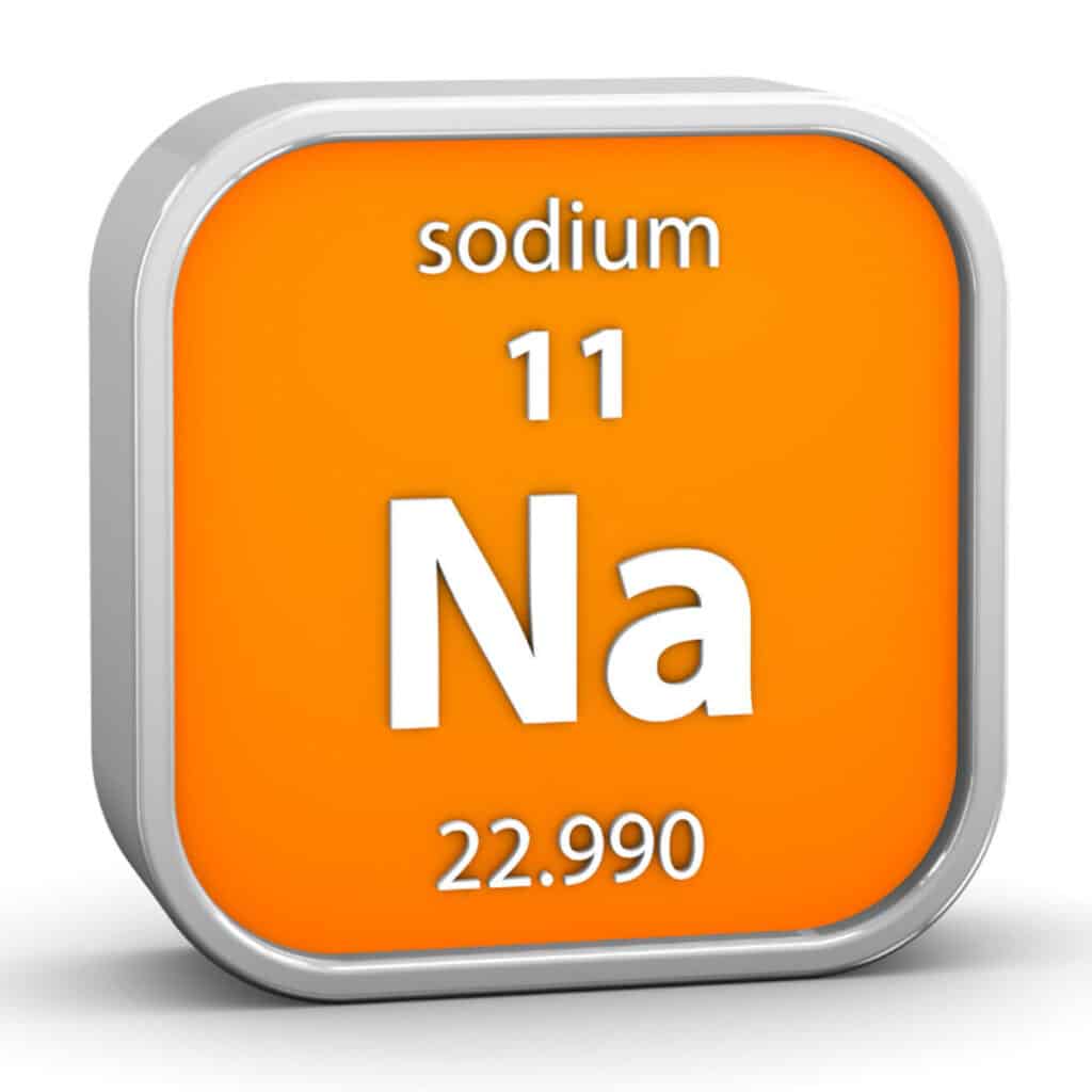 Orange cube representing sodium on the periodic table.