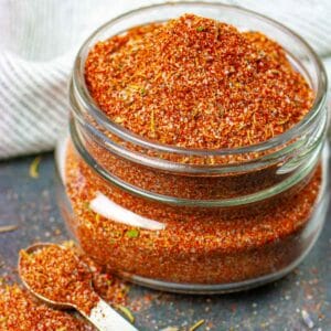 Keto barbeque rub in a small glass wide mouth jar.