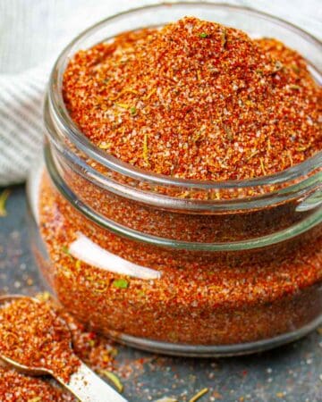 Keto barbeque rub in a small glass wide mouth jar.