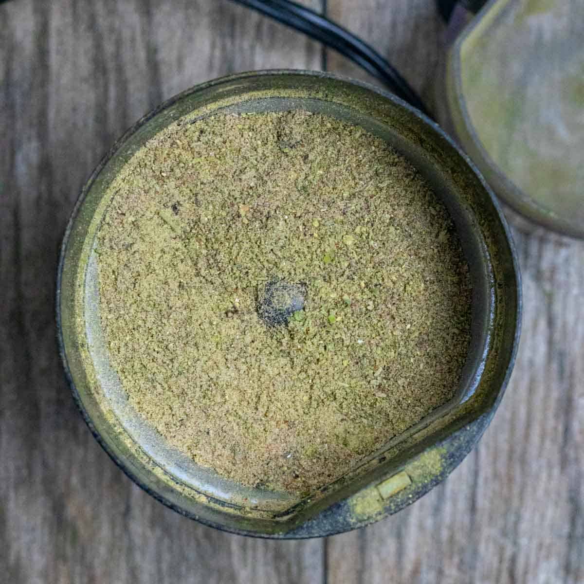 All purpose seasoning blend in spice grinder after grinding.