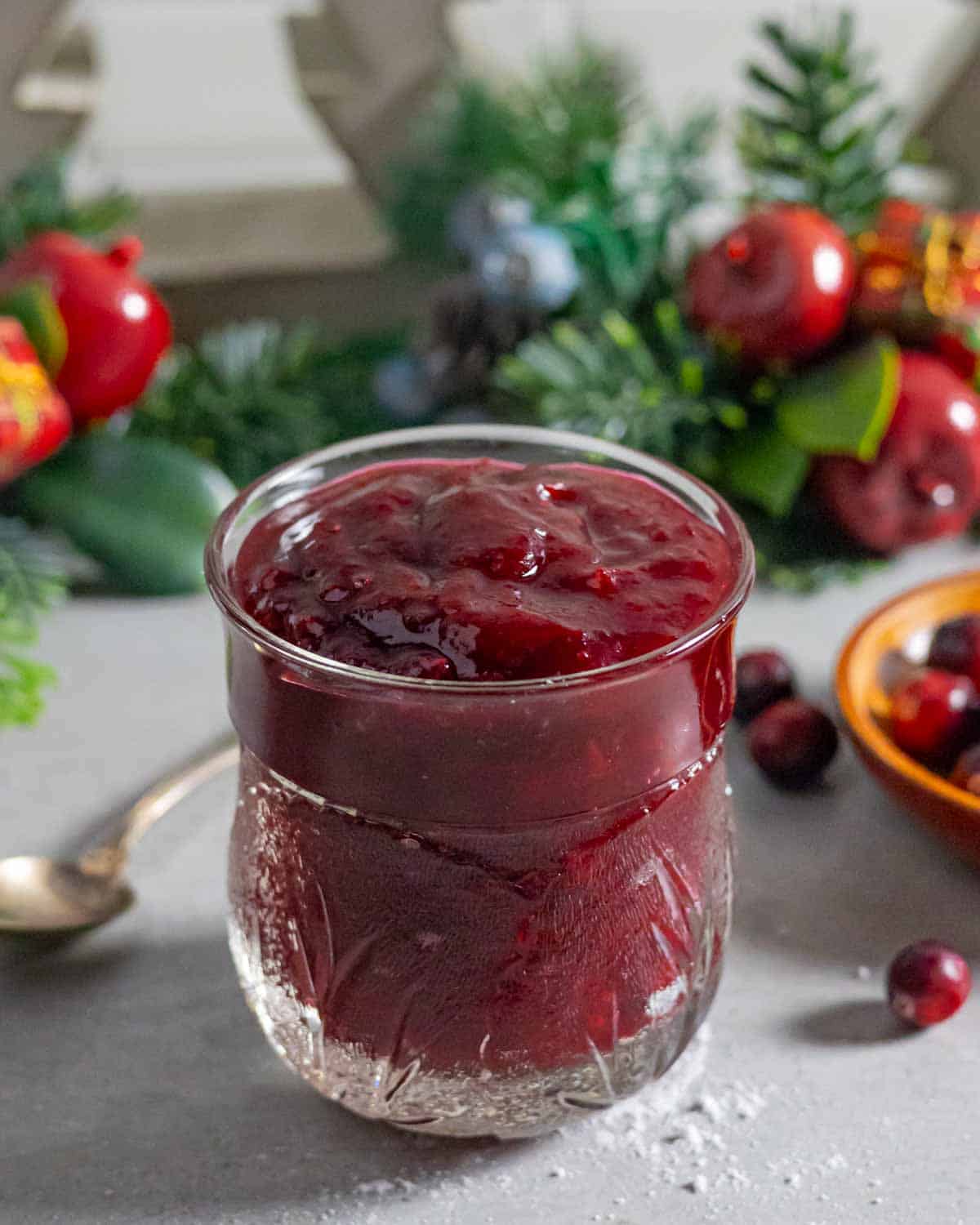 Sugar-free jam made with cranberries in a decorative serving jar.