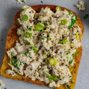 Miso tuna on golden toasted slice of bread.