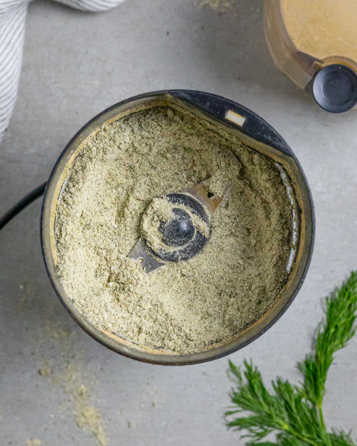 Coffee grinder with ground gluten free ranch seasoning mix.