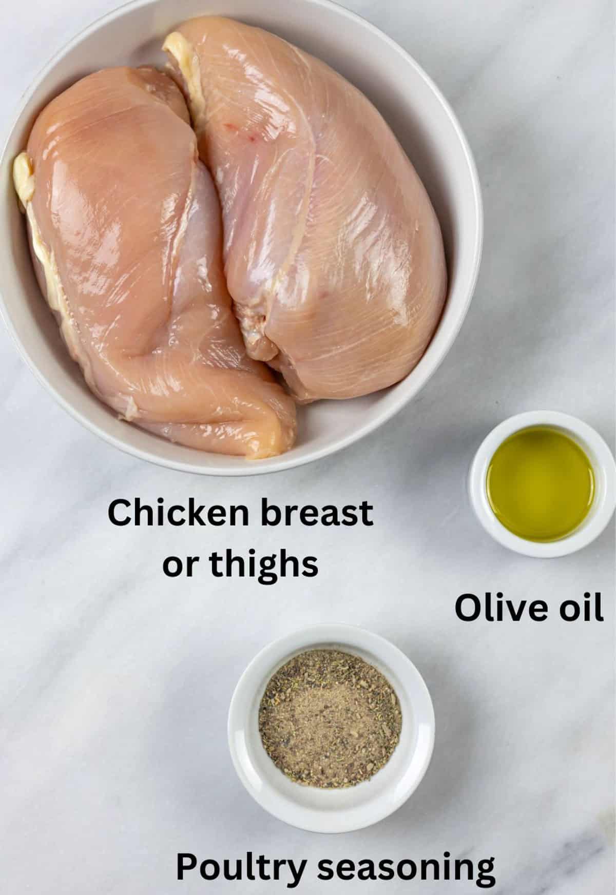 Ingredients for Dutch oven shredded chicken in small bowls with black text labels.